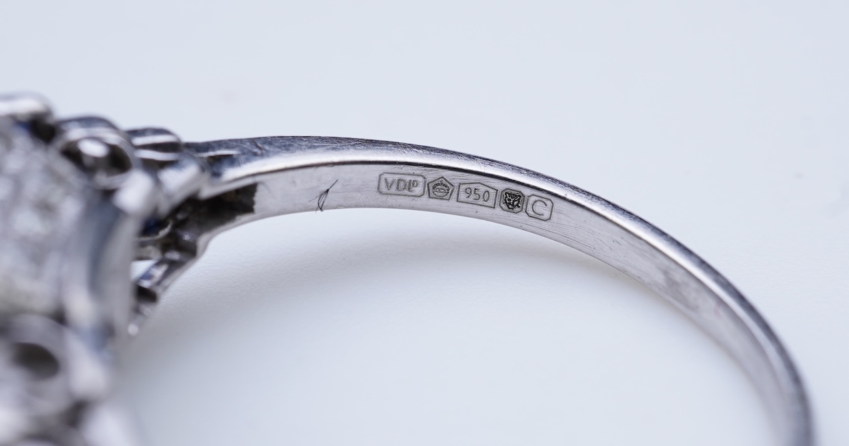 An aquamarine, sapphire and diamond ring